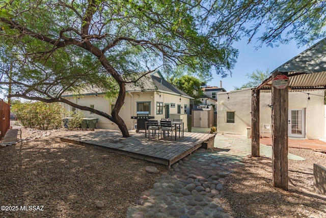 118 N Hoff Ave, Tucson, AZ 85705 - view of yard with a wooden deck and outdoor dining space