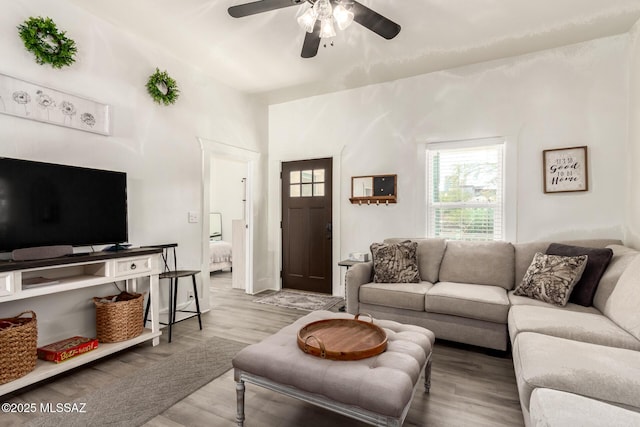 118 N Hoff Ave, Tucson, AZ 85705 - living room with a ceiling fan and wood finished floors