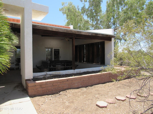 11985 N Cayce Ln, Casa Grande, AZ 85194 - rear view of property with ceiling fan, stucco siding, and a patio