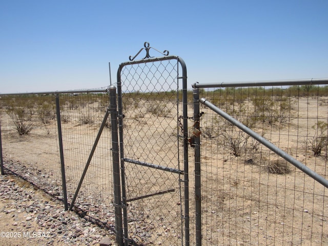 11985 N Cayce Ln, Casa Grande, AZ 85194 - gate featuring a view of rural / pastoral area