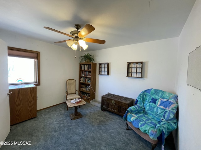11985 N Cayce Ln, Casa Grande, AZ 85194 - living area with carpet flooring and a ceiling fan