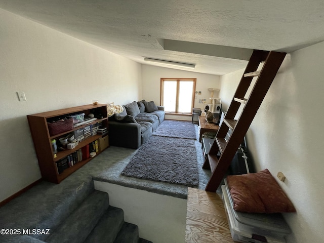 11985 N Cayce Ln, Casa Grande, AZ 85194 - carpeted living room featuring a textured ceiling