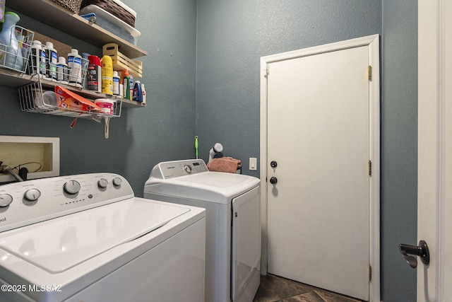 983 N Via Zahara Del Sol, Tucson, AZ 85748 - laundry room with separate washer and dryer and dark stone finish floors