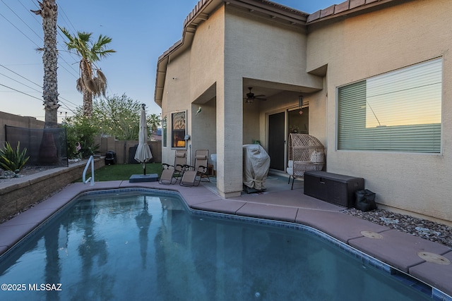 983 N Via Zahara Del Sol, Tucson, AZ 85748 - view of swimming pool with a patio, a fenced backyard, ceiling fan, and grilling area