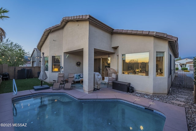 983 N Via Zahara Del Sol, Tucson, AZ 85748 - view of pool featuring a fenced backyard, a patio, and an outdoor living space
