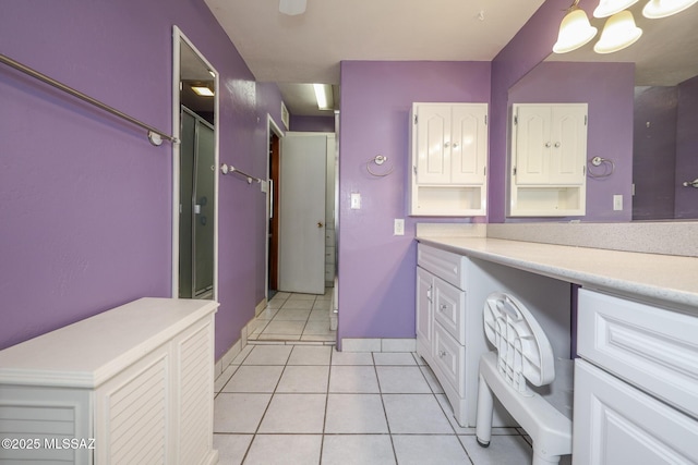 3431 N Edith Blvd, Tucson, AZ 85716 - bathroom with tile patterned floors, vanity, and a shower with door