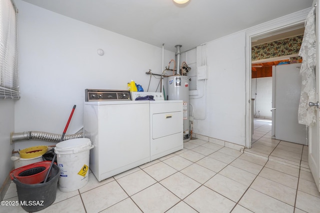 3431 N Edith Blvd, Tucson, AZ 85716 - washroom with water heater, separate washer and dryer, and light tile patterned floors