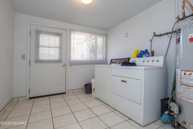 3431 N Edith Blvd, Tucson, AZ 85716 - laundry room featuring washer and dryer, healthy amount of natural light, and water heater