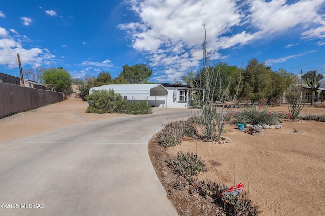 3431 N Edith Blvd, Tucson, AZ 85716 - view of front of home featuring a carport and concrete driveway