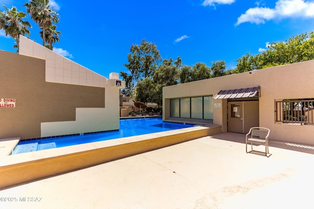 7612 E Callisto Cir Unit 60, Tucson, AZ 85715 - community pool with a patio area