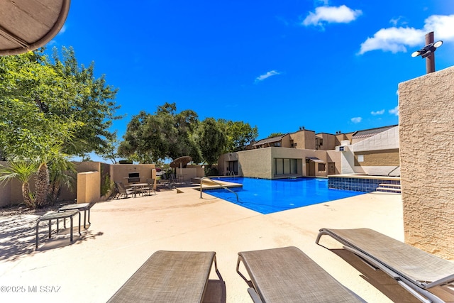 7612 E Callisto Cir Unit 60, Tucson, AZ 85715 - community pool with a patio