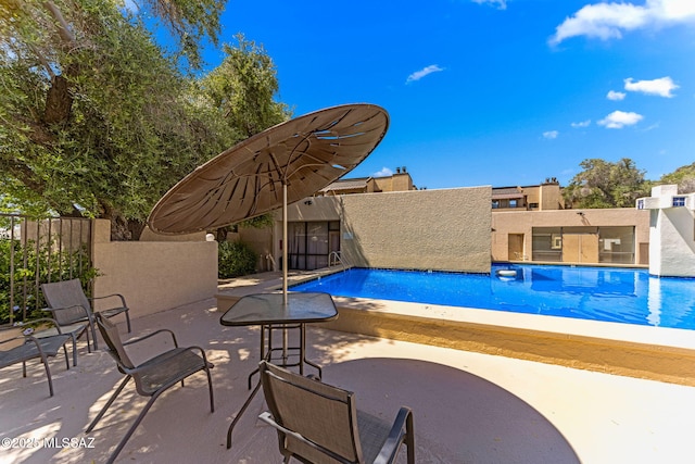 7612 E Callisto Cir Unit 60, Tucson, AZ 85715 - community pool featuring a patio area