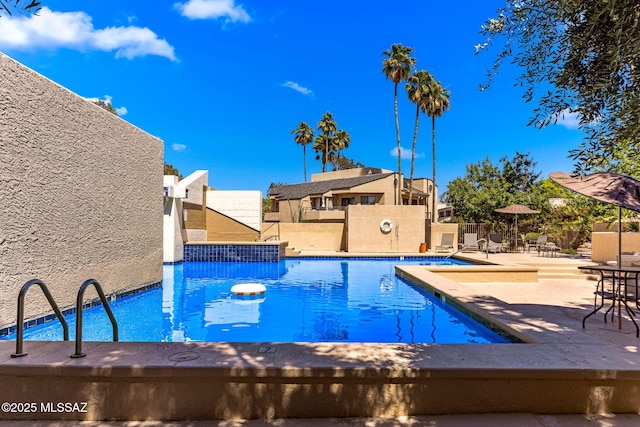 7612 E Callisto Cir Unit 60, Tucson, AZ 85715 - community pool with a patio area