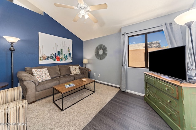 7612 E Callisto Cir Unit 60, Tucson, AZ 85715 - living room featuring dark wood finished floors, lofted ceiling, a ceiling fan, and baseboards