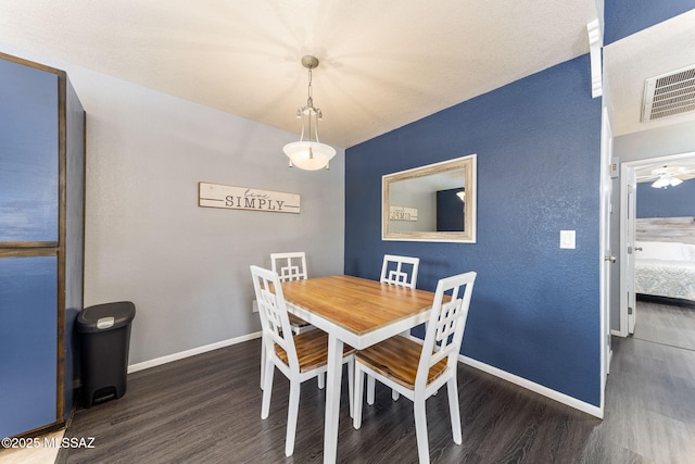 7612 E Callisto Cir Unit 60, Tucson, AZ 85715 - dining space featuring wood finished floors and baseboards
