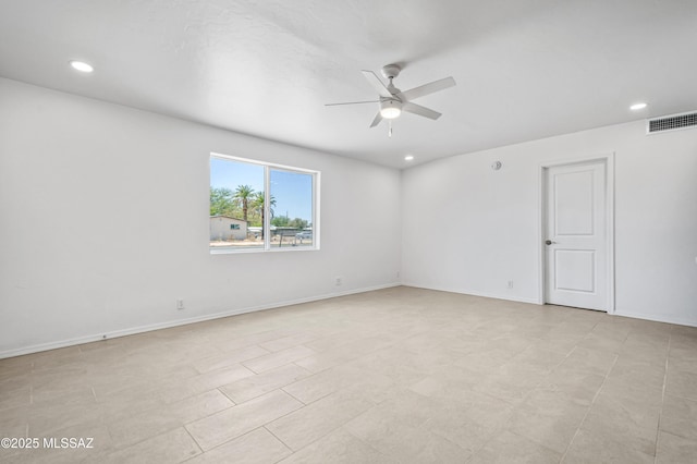 4167 E Los Robles St, Tucson, AZ 85712 - unfurnished room with ceiling fan, recessed lighting, and baseboards