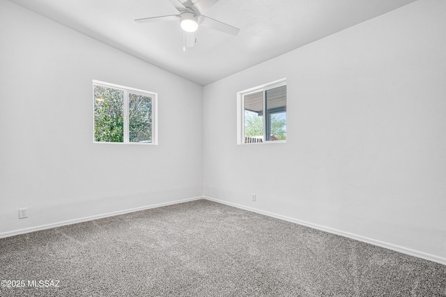 4167 E Los Robles St, Tucson, AZ 85712 - empty room with a ceiling fan, carpet flooring, lofted ceiling, and baseboards