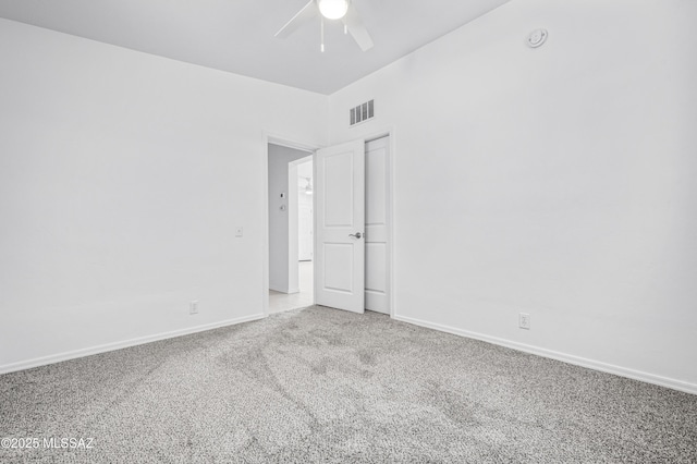 4167 E Los Robles St, Tucson, AZ 85712 - spare room featuring a ceiling fan, carpet, and baseboards