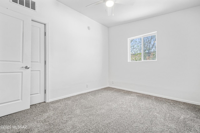 4167 E Los Robles St, Tucson, AZ 85712 - unfurnished bedroom with carpet floors, baseboards, and a ceiling fan