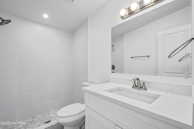 4167 E Los Robles St, Tucson, AZ 85712 - full bathroom with a tile shower, toilet, and vanity