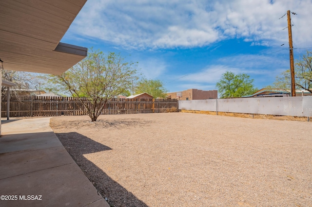 4167 E Los Robles St, Tucson, AZ 85712 - fenced backyard with a patio area