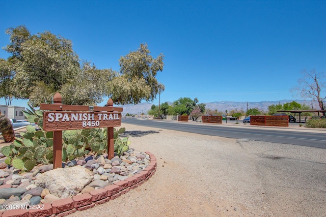 8450 E Old Spanish Trl Unit 157, Tucson, AZ 85710 - community / neighborhood sign featuring a mountain view