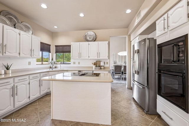1920 W Canada Hills Dr, Oro Valley, AZ 85737 - kitchen with black appliances, white cabinetry, a sink, recessed lighting, and a kitchen island