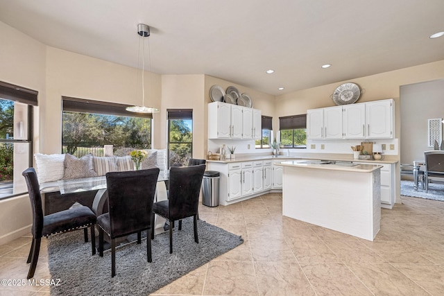 1920 W Canada Hills Dr, Oro Valley, AZ 85737 - kitchen with light countertops, white cabinets, pendant lighting, and recessed lighting