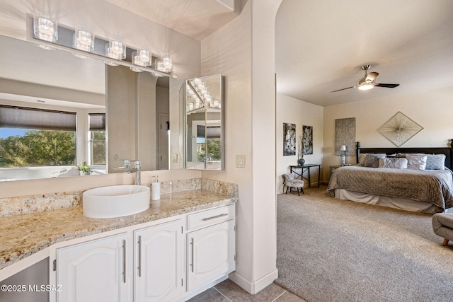 1920 W Canada Hills Dr, Oro Valley, AZ 85737 - bathroom featuring ensuite bathroom, vanity, a ceiling fan, and tile patterned flooring