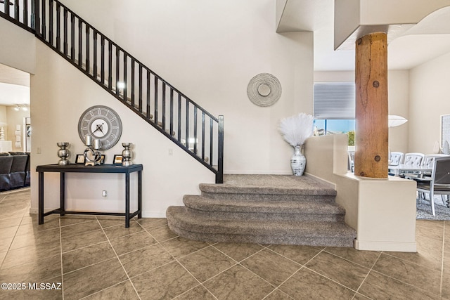 1920 W Canada Hills Dr, Oro Valley, AZ 85737 - staircase with a towering ceiling and tile patterned flooring