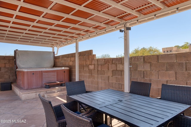 9141 E Bell Cactus Ln, Tucson, AZ 85715 - view of patio / terrace with a hot tub and outdoor dining space