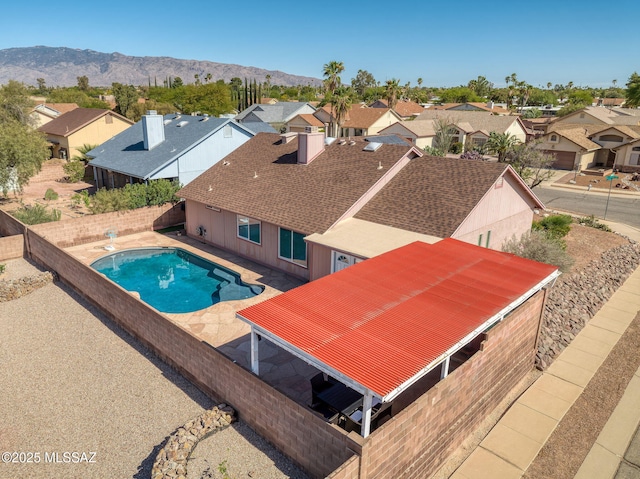 9141 E Bell Cactus Ln, Tucson, AZ 85715 - view of pool with a residential view, a fenced backyard, and a mountain view