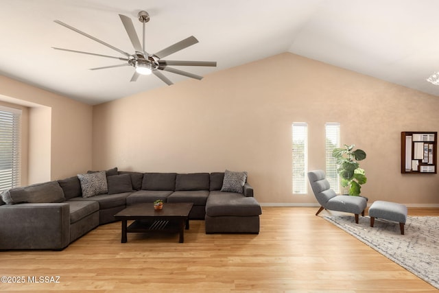 9141 E Bell Cactus Ln, Tucson, AZ 85715 - living room with vaulted ceiling, a ceiling fan, light wood finished floors, and plenty of natural light