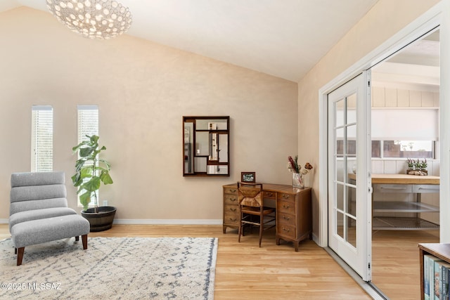 9141 E Bell Cactus Ln, Tucson, AZ 85715 - home office with vaulted ceiling, wood finished floors, and baseboards