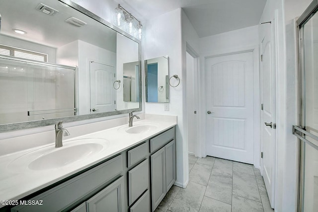 11710 W Boll Bloom Dr, Marana, AZ 85653 - bathroom with double vanity and a stall shower