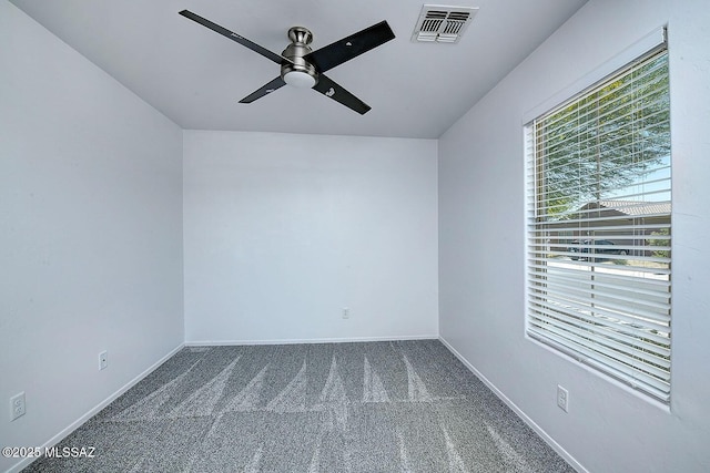 11710 W Boll Bloom Dr, Marana, AZ 85653 - carpeted spare room featuring a ceiling fan and baseboards
