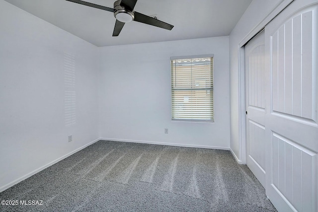 11710 W Boll Bloom Dr, Marana, AZ 85653 - unfurnished bedroom featuring carpet, baseboards, a closet, and a ceiling fan