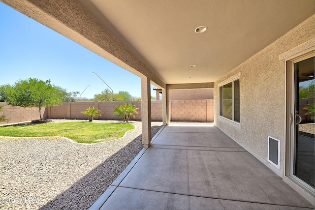 11710 W Boll Bloom Dr, Marana, AZ 85653 - fenced backyard with a patio area