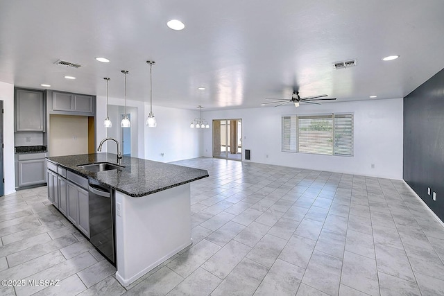 11710 W Boll Bloom Dr, Marana, AZ 85653 - kitchen with a sink, dishwashing machine, gray cabinets, a ceiling fan, and recessed lighting