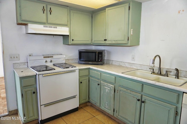 100 N Dale Rd, Pearce, AZ 85625 - kitchen featuring white range with electric stovetop, under cabinet range hood, stainless steel microwave, a sink, and green cabinets