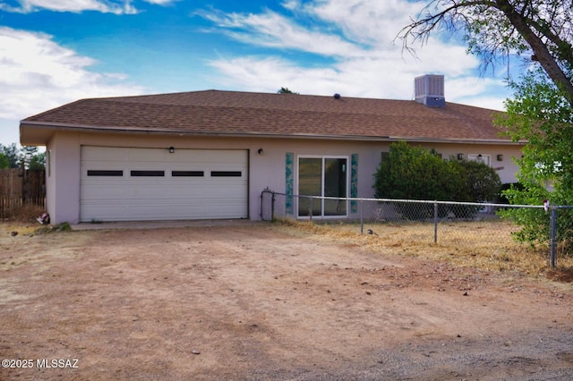 100 N Dale Rd, Pearce, AZ 85625 - single story home featuring stucco siding, dirt driveway, an attached garage, central air condition unit, and roof with shingles