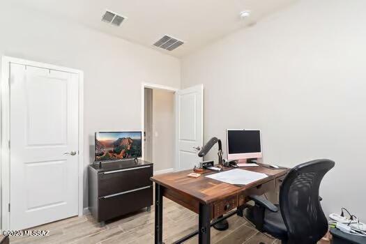 11815 N Silverscape Dr, Oro Valley, AZ 85737 - office area with light wood-style floors