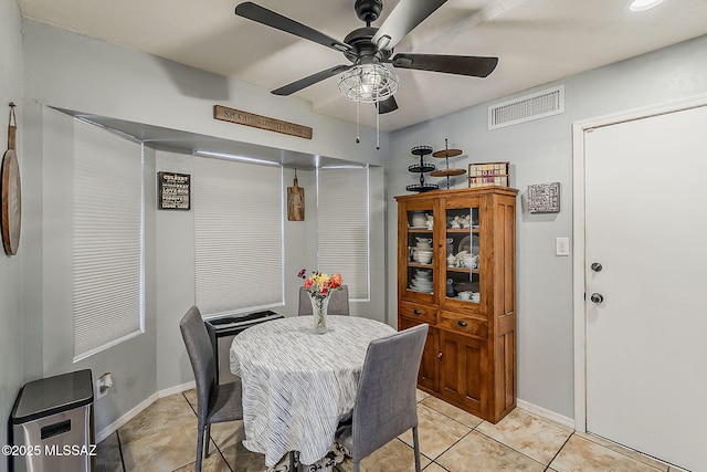 9650 N Gyor Pl, Tucson, AZ 85742 - dining space featuring ceiling fan, light tile patterned floors, and baseboards