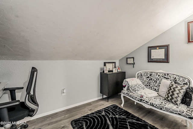 9650 N Gyor Pl, Tucson, AZ 85742 - living area featuring lofted ceiling, light wood-style flooring, and baseboards
