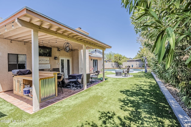 9650 N Gyor Pl, Tucson, AZ 85742 - view of yard featuring french doors and a patio