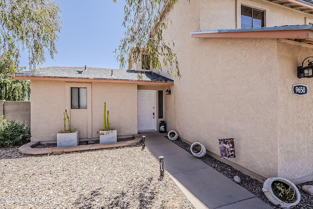 9650 N Gyor Pl, Tucson, AZ 85742 - view of exterior entry featuring stucco siding