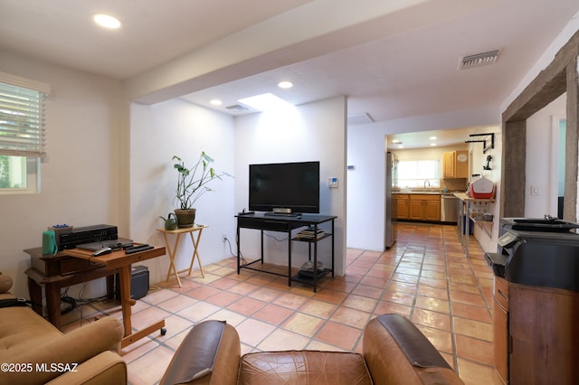 2931 N Mitch Dr, Tucson, AZ 85719 - living room with recessed lighting and light tile patterned flooring