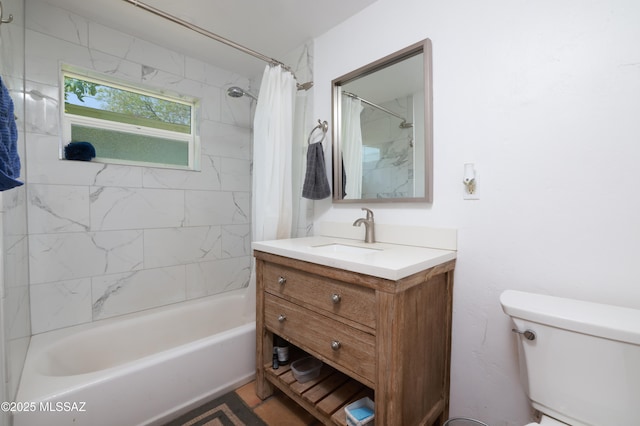 2931 N Mitch Dr, Tucson, AZ 85719 - bathroom featuring shower / bath combo with shower curtain, toilet, and vanity