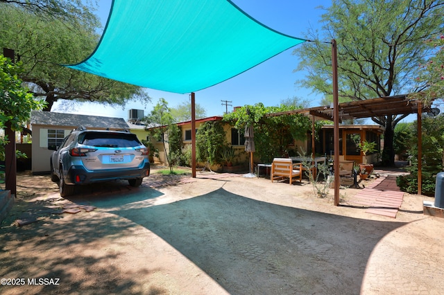 2931 N Mitch Dr, Tucson, AZ 85719 - view of patio / terrace with a pergola and central AC unit