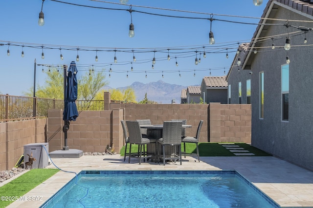 5550 S Sycamore Rim Trl, Tucson, AZ 85747 - view of swimming pool featuring a patio area and a mountain view